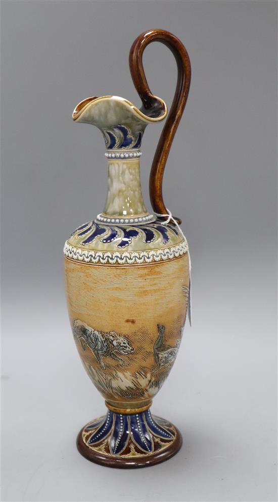 A Doulton Lambeth pottery ewer by Hannah Barlow, decorated with a dog chasing ducks height 36cm